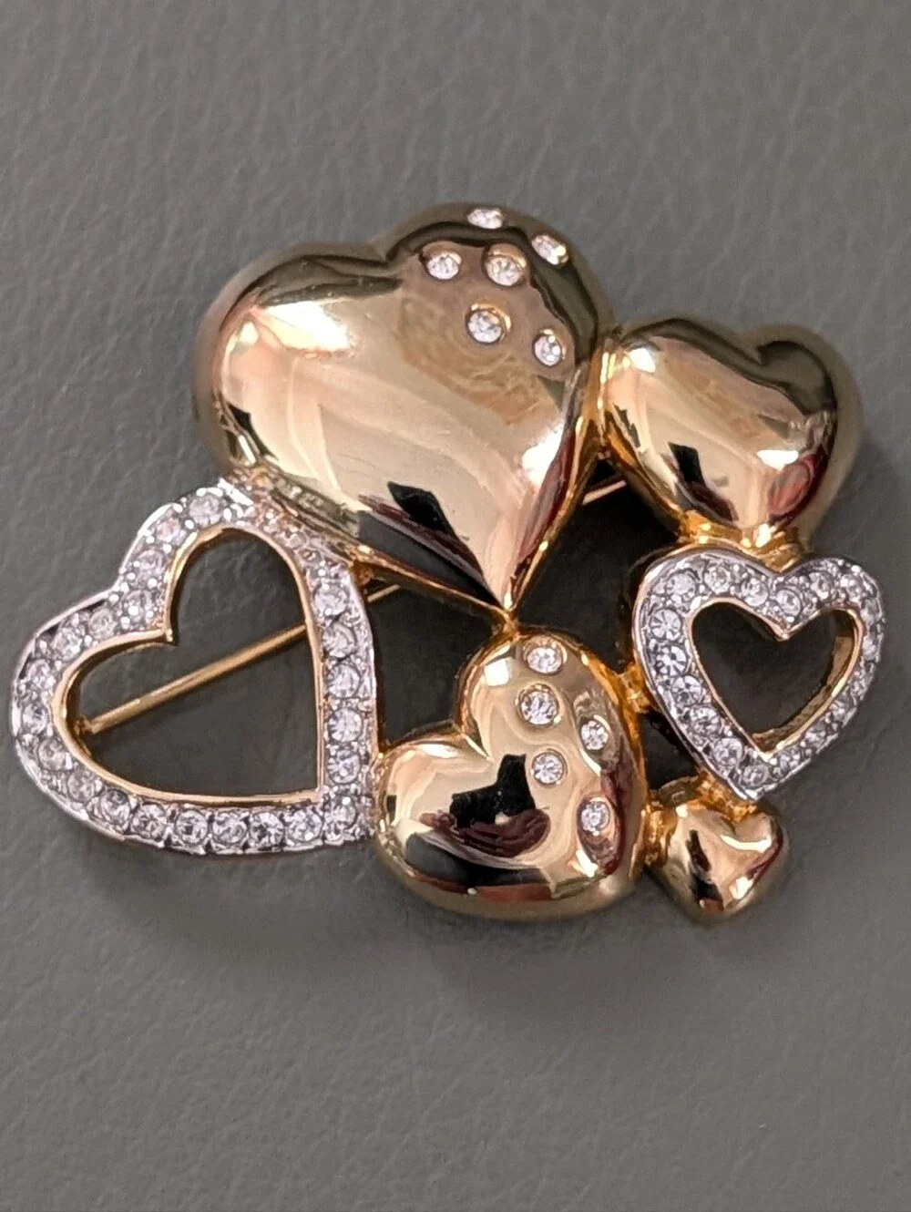 Vintage 3D Gold Tone Heart Cluster Brooch Adorned With Clear Rhinestones